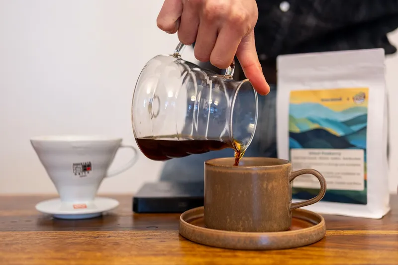 Pouring a pour over from a Hario Ceramic
